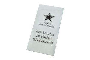 Silicone label with washing instructions - black print